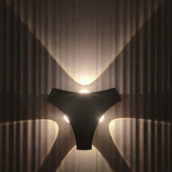 Artistic Tri Wing LED Wall Light with Sculptural Beam Effect
