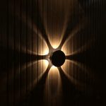 Modern LED Wall Light with Artistic Beam Pattern & Adjustable Focus
